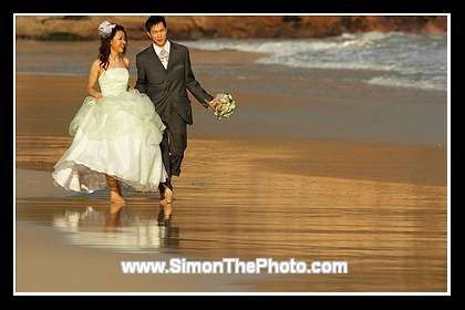 Fion & John walking on the Beack